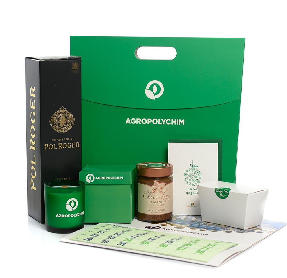 AGROPOLYCHIM corporate Christmas gift collection with a candle, greeting card and branded gift packaging.